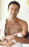 JulianMcMahon - mit baby.webp